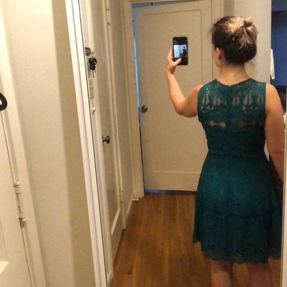 Lace dress with peek-a-boo bodice - Picture 4 of 5